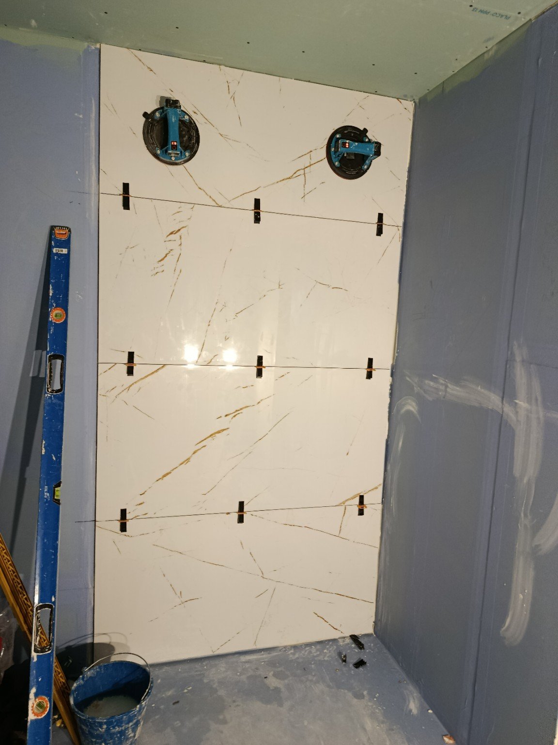 Bathroom tile alignment and levelling
