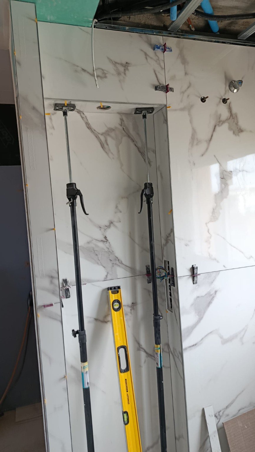 Precision shower wall tiling