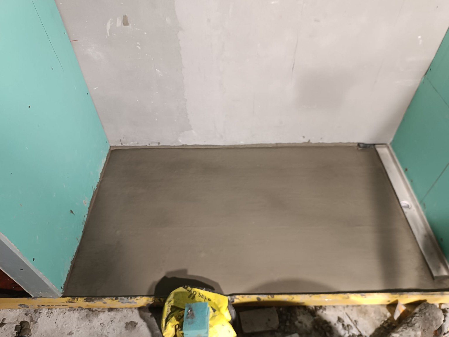 Shower base preparation and drainage detail